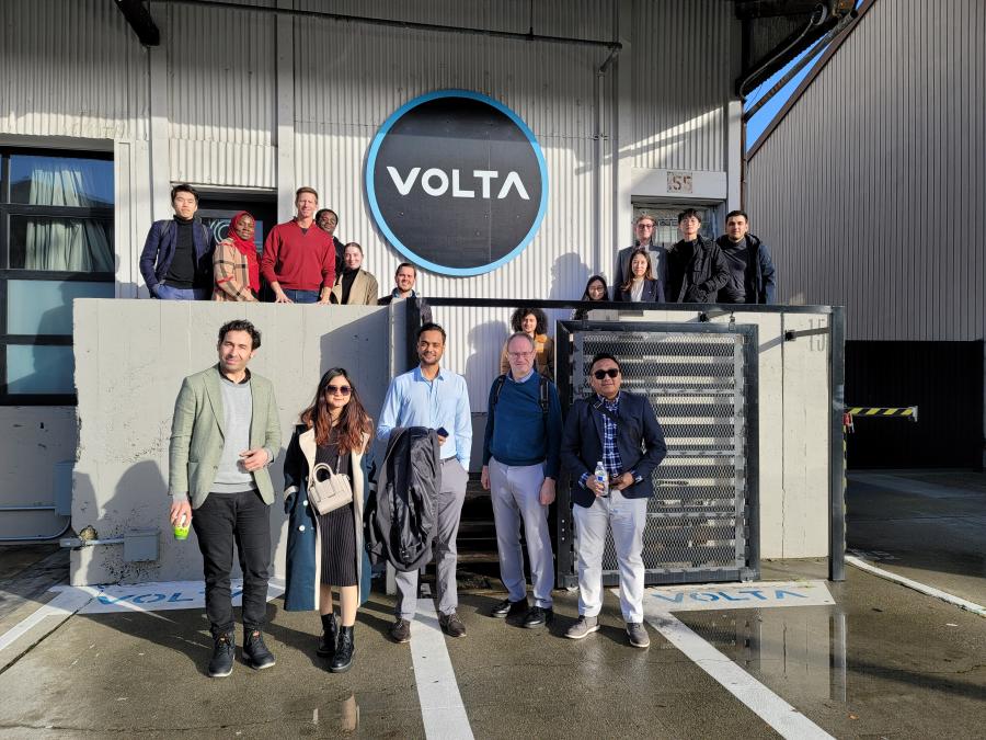 MBA Societal Shifts participants pose in front of Volta
