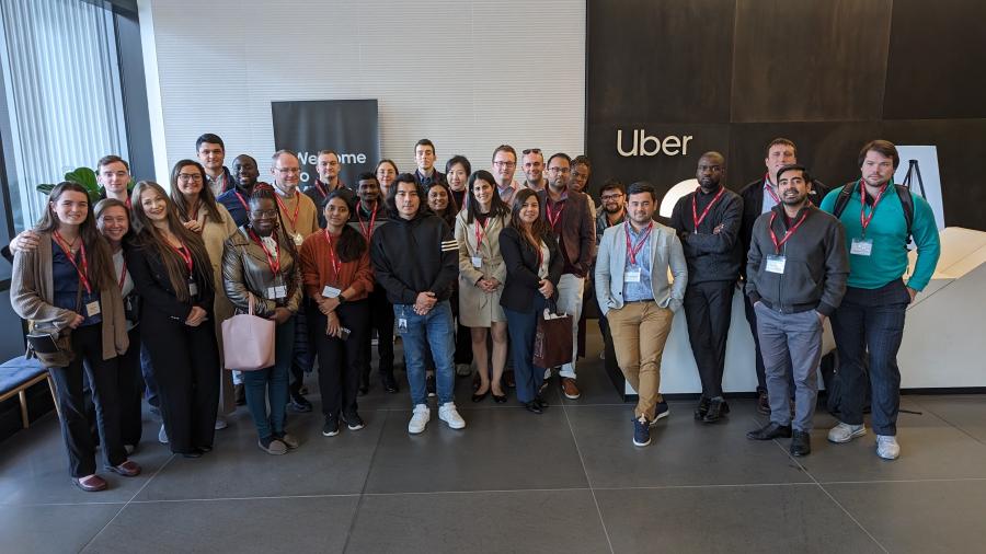 MBA Societal Shifts participants pose in front of Uber