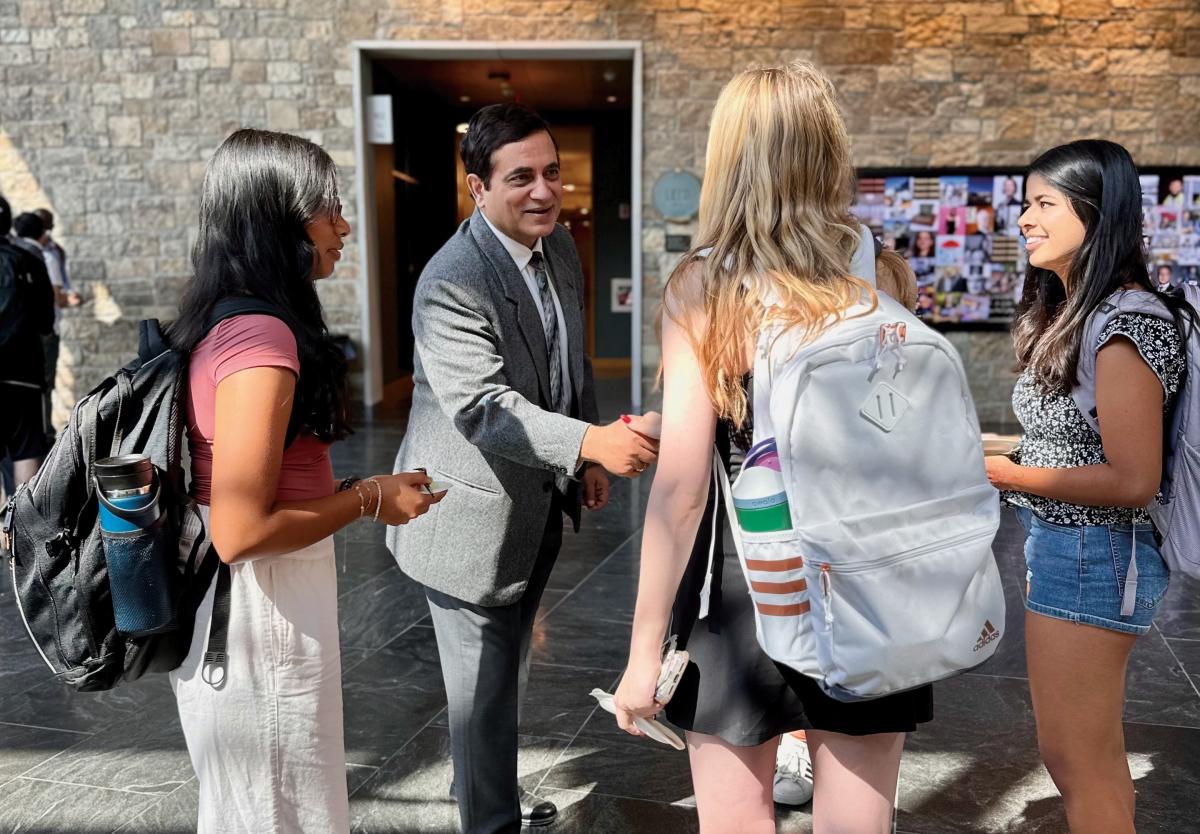 Lehigh Business Dean Manoj Malhotra and students