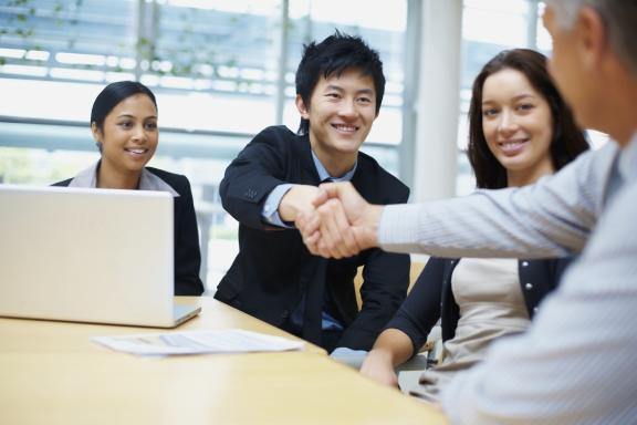 group meeting and handshake