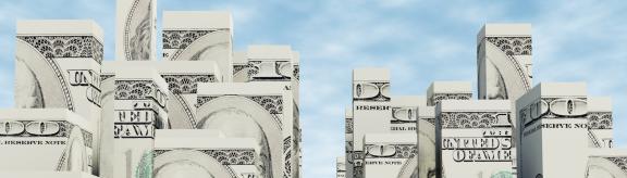 dollar bills in the shape of skyscrapers