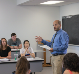 C.Meyerhoefer teaching a course