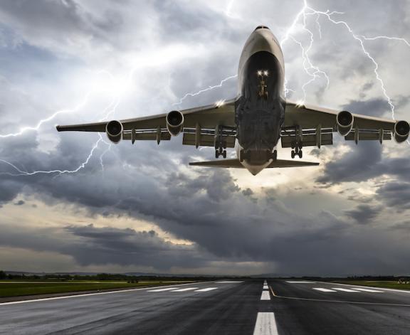 plane taking off during storm